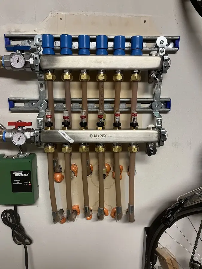 Plumber performing Water Heater Repair at a residential property in Lamont